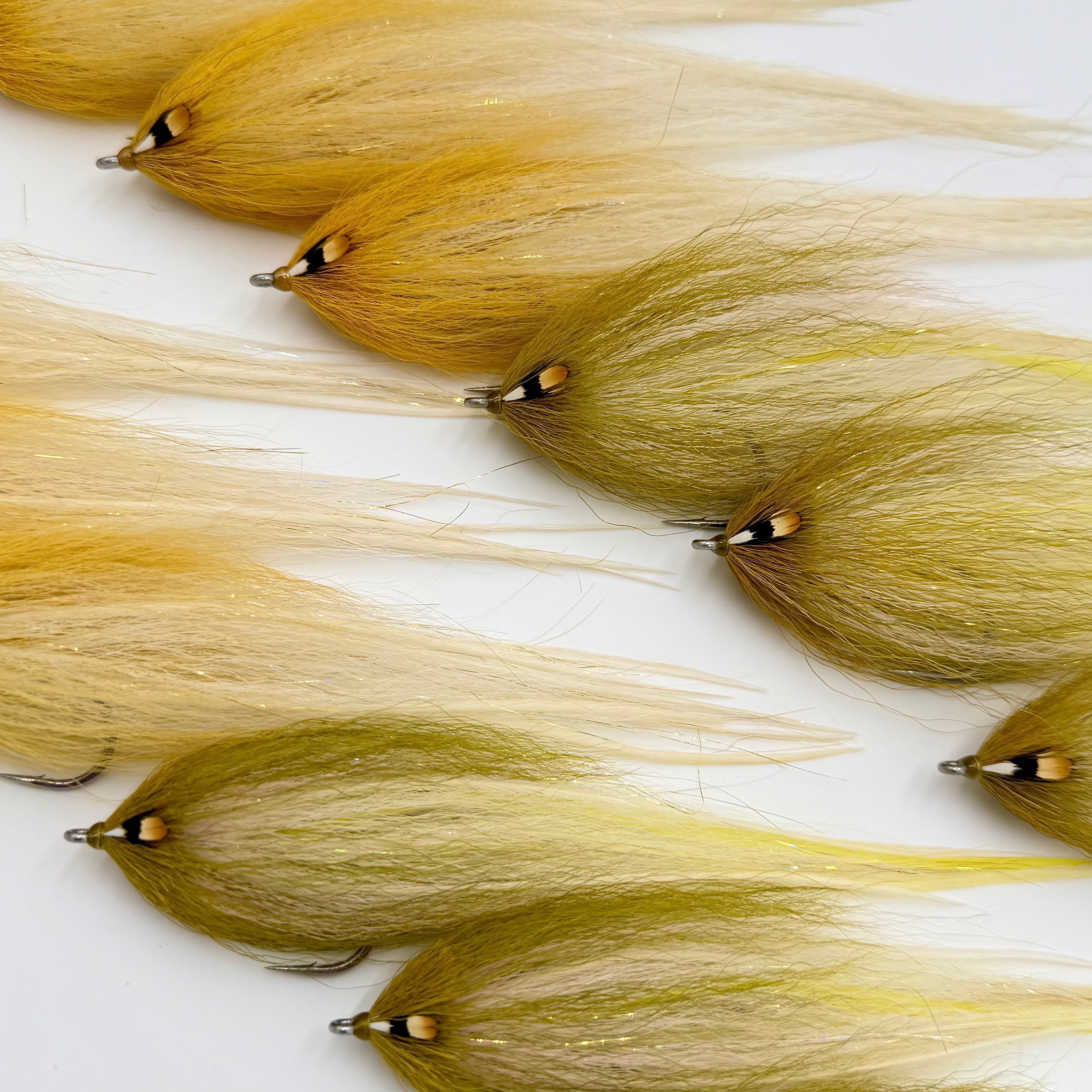 Hollow flies tied by Joe Webster for striped bass and more