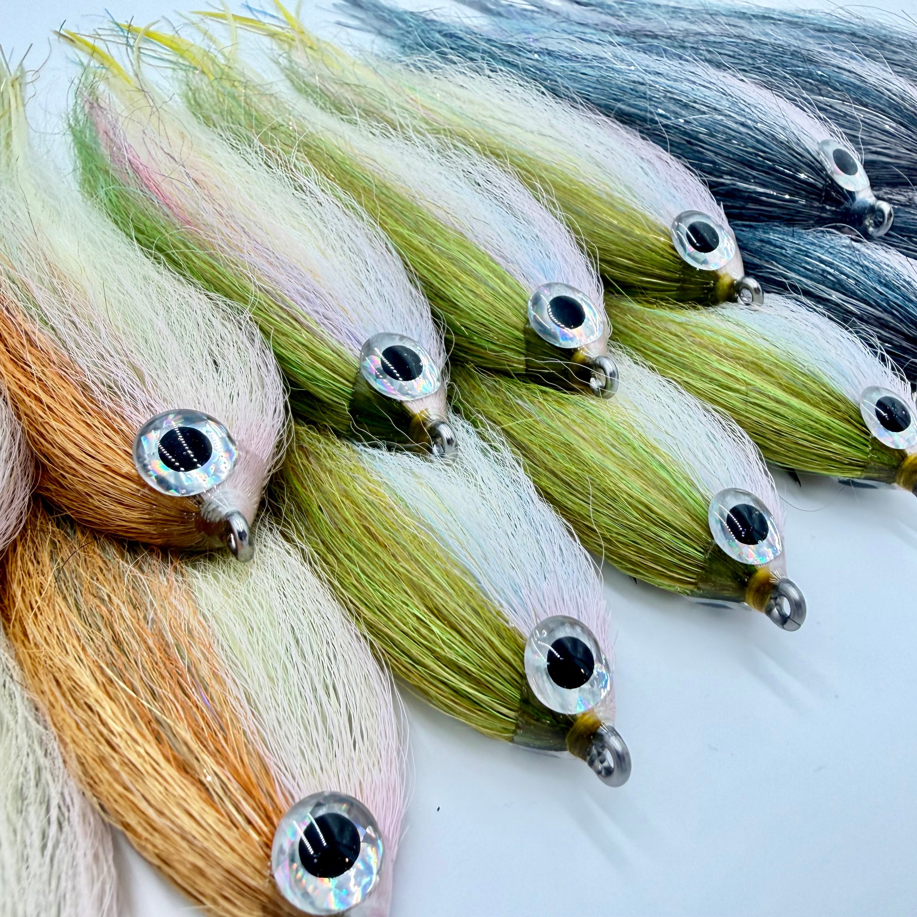 Hollow fly for striped bass, marlin, tuna and more  tied by Joe Webster using squimpish fibers, bucktail, and feathers